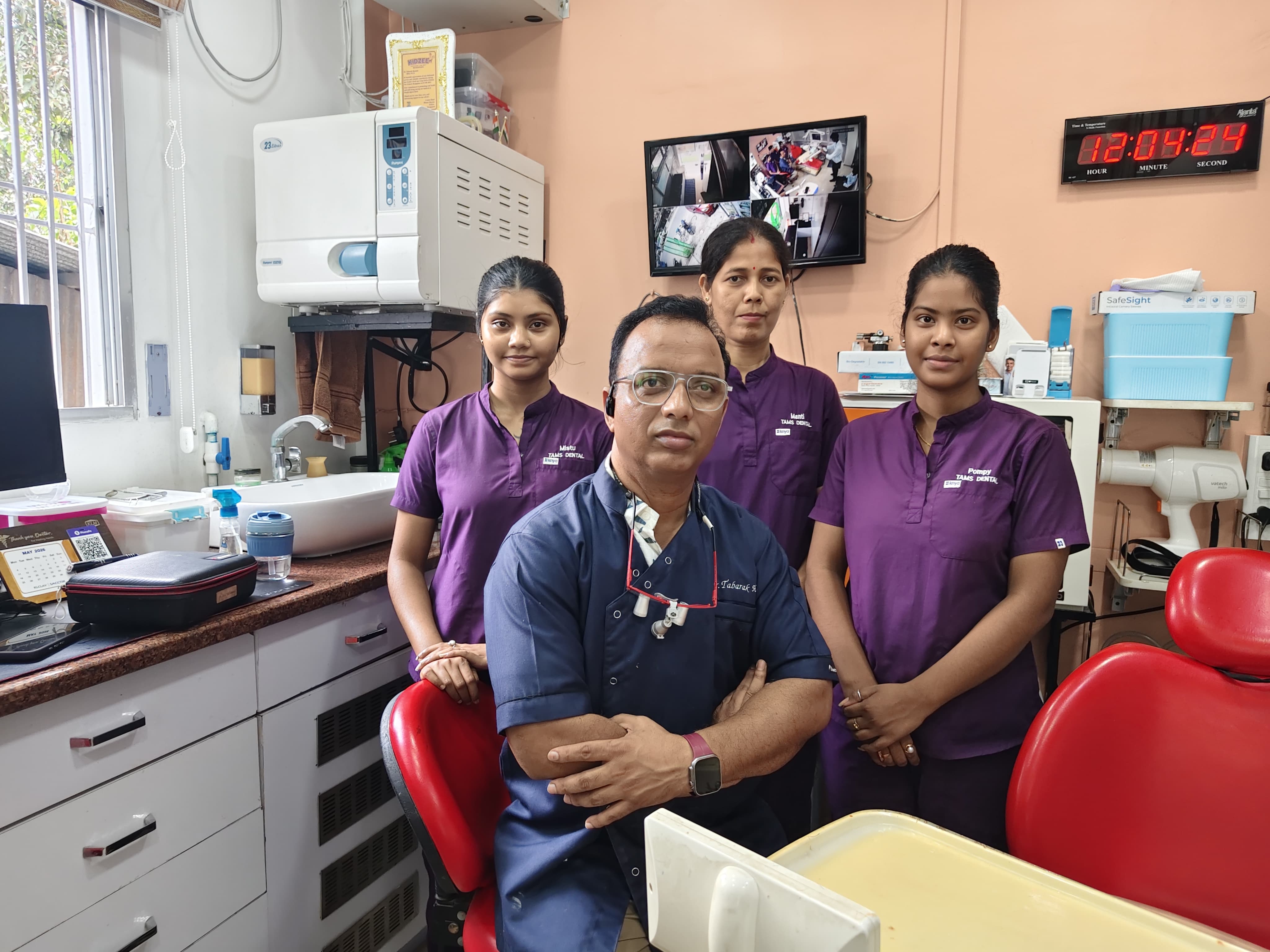 Dr. Tabarak Hussain and the TAMS Dental team